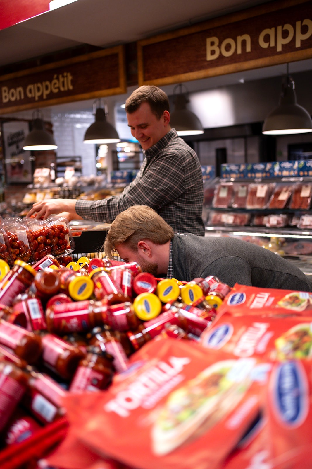 Team members working in the deli section
